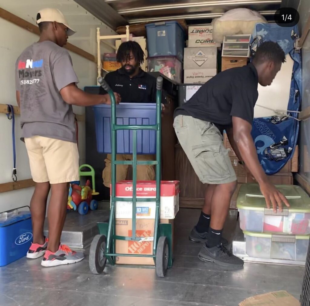 movers inside the truck with packages